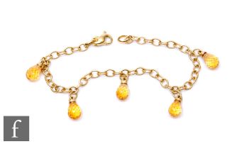 A 9ct open curb link bracelet with five facetted citrene drops suspended, weight 7.5g, length