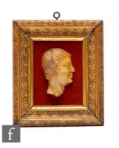 A 19th Century veined marble side profile of a Roman bust, in a contemporary gilt frame, height 7cm.