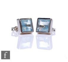 A pair of 9ct hallmarked white gold aquamarine single stone stud earrings, collar set square cut