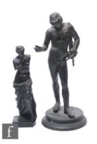 A 19th Century French bronze figure of a semi naked robed classical female, signed on the base Musee