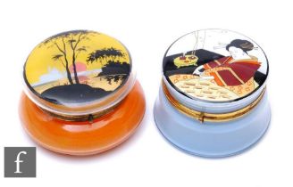 A 1930s French Art Deco powder box, of squat ovoid form with hinge lid, reverse enamelled with a