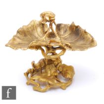 A 19th Century French gilt metal sweetmeat dish modelled as a lizard on two leaves, on a