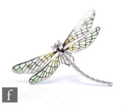 A silver diamond and plique a jour enamel pendant/brooch modelled as a dragonfly with pale green