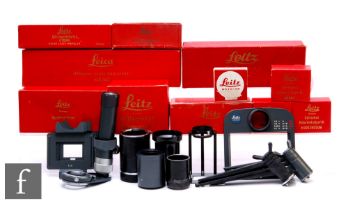 A collection of boxed Leica camera accessories, to include SOOKY close-up device, BOOWU copy set,