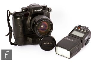 A Minolta Dynax 9 with Minolta zoom 24-85mm f3.5 lens.