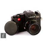 A Leitz Portugal Leica R3 MOT Electronic SLR Camera, 1979, black, serial no. 1509633, with a Leitz