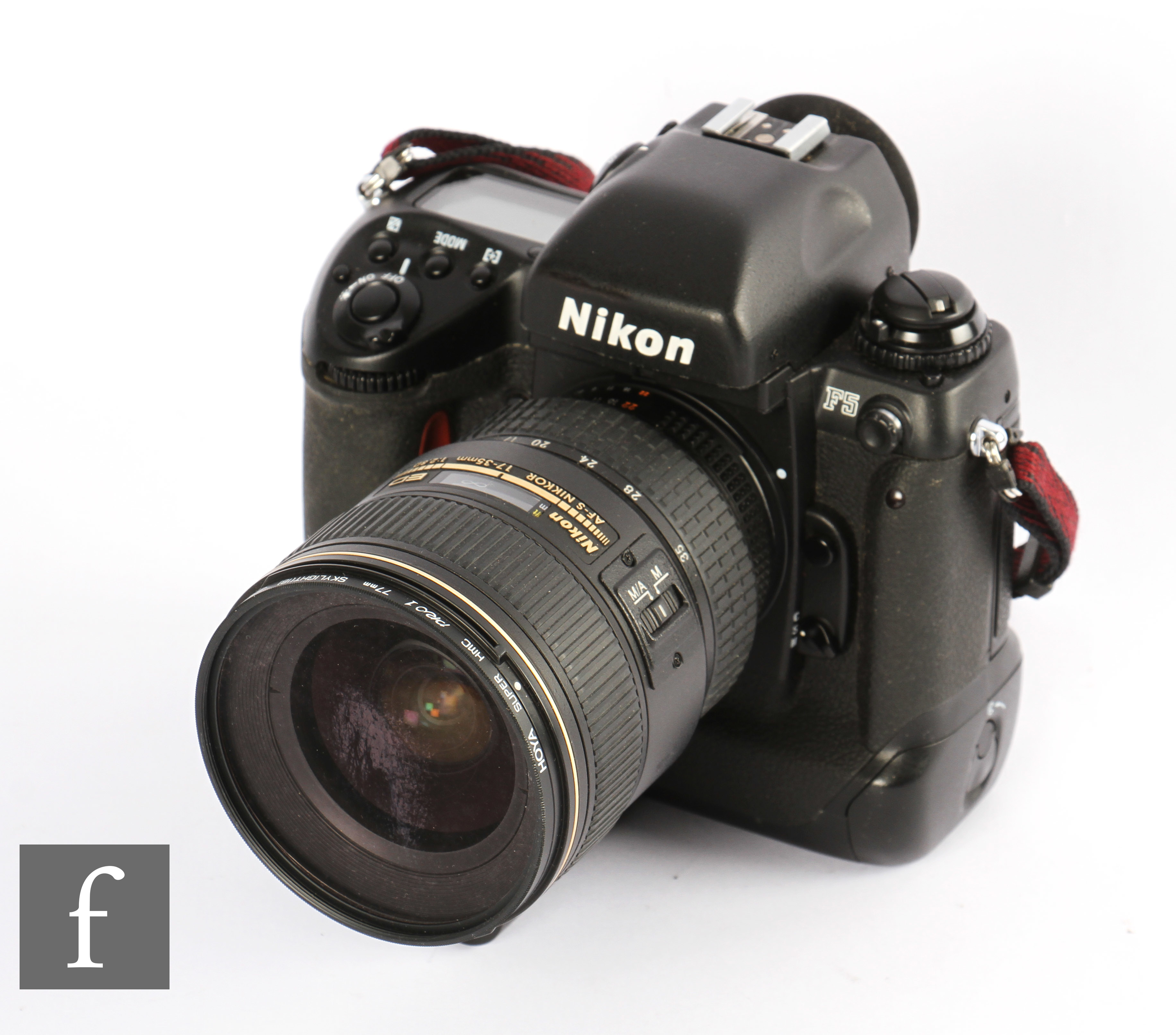 A Nikon F5 with AFS Nikkor 17-35mm with F.1:2:8 lens.