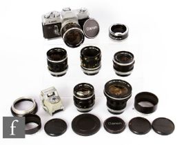 A Canon Pellix QL camera outfit, serial number 141099, including camera body, four lenses