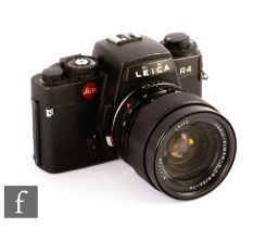 A Leica R4 Schwz camera, serial number 1609817, with Vario-Elmar-R 35-70mm f/3.5.