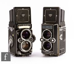 Two Rolleiflex TLR cameras, to include a Rollei Magic II and Rollei 2.8F, serial number 2418804.