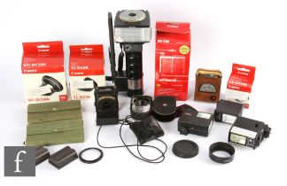 A collection of various camera accessories, to include boxed Canon digital camera accessories,