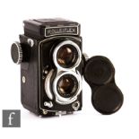A Rollei Baby 4 x 4 Rolleiflex Black TLR Camera circa 1963-68, serial number 2065424.
