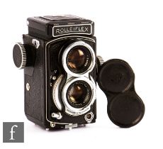 A Rollei Baby 4 x 4 Rolleiflex Black TLR Camera circa 1963-68, serial number 2065424.