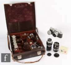 A Leica IIIf camera outfit to include Leica body serial number 632825, with Summitar