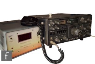 A Yaesu FT101ZD HF Transceiver, with microphone and leads and squelch modification to case, with