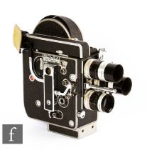 A Bolex H8 Reflex Camera, with Kern Switar f/1.6 5.5mm lens, and two others.