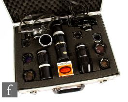 An Olympus Pen FT Half Framce Camera outfit, 1966-72, to include two camera bodies, black and