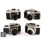 Four Ihagee Exakta SLR cameras, to include three VX1000 and one EXA IIb.