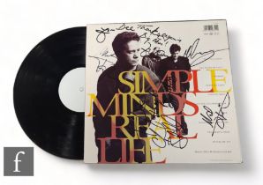 Simple Minds - A signed Real Life LP, signed by band members and dedicated 'For Dee Thanks Again Big