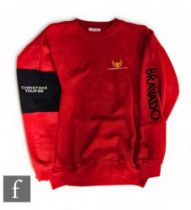 Magnum - A 1988 Christmas tour red sweatshirt, unlabelled, size approximately M/L. *A Tour Manager's