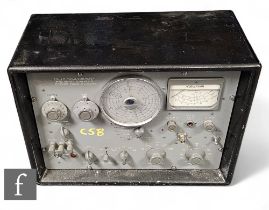 A Marconi 1960's FM/AM signal generator TF995A/2M, grey case.