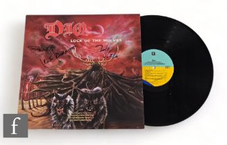 Dio - A signed Lock Up The Wolves LP, signed by Jens Johansson, Simon Wright and one indistinct