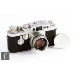 A Leica IIIg, circa 1957, with Summicron f2/50 lens, chrome body, serial number 904 952.