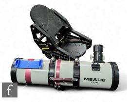 A Meade LXD75 astronomical telescope with bracket, length 69cm.