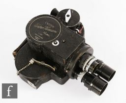 An Ensign Super Kinecam Sixteen film camera, serial number Z.1366, with three J. H. Dallmeyer lenses