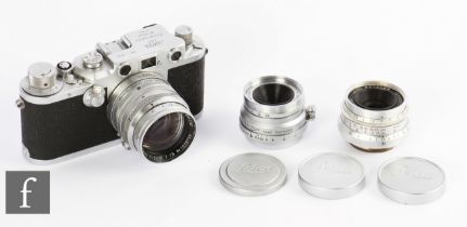 A Leica IIIc, circa 1950, serial number 511024, with Summarit 50mm f/1.5, and additional lenses,