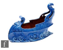 Reginald Pearce - C.H Brannam - A table centre bowl modelled in the form of a galleon, with waves