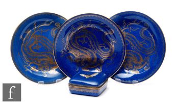 Wedgwood - A set of three plates designed for James Powell and Sons (Whitefriars), each decorated