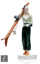 Katzhutte - A 1930s Art Deco figure modelled as a lady in fashionable ski wear carrying skis and