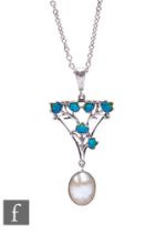 Attributed to Jessie M.King - Liberty & Co - An open work silver, enamel and blister pearl pendant