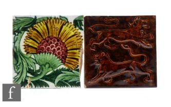 William De Morgan - Sands End Pottery - A 6 inch dust pressed tile, relief moulded with two lions