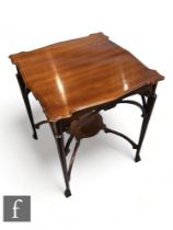 Unknown - A late 19th Century continental Art Nouveau table in mahogany with fine box wood strung