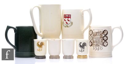 Keith Murray - Wedgwood - A collection of four tankards, to include an example with a green matte