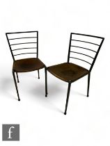Robert Heal - Staples - A pair of 1960s Ladderax chairs, the braised steel frame with tan leather