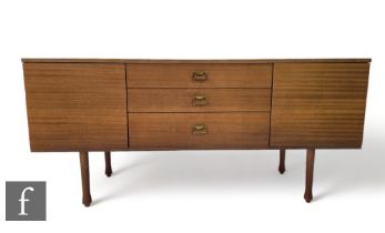Avalon Furniture - A mid Century teak dressing table/sideboard, with three central drawers flanked