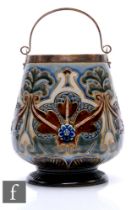 Florence Barlow - Doulton Lambeth - A large late 19th Century biscuit jar of footed ovoid form,