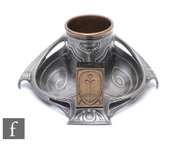 WMF - An Art Nouveau pewter smoker's companion, decorated with embossed whiplash line decoration,