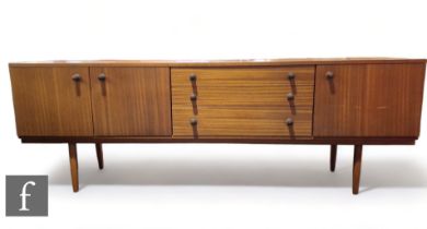 Avalon Furniture - A mid Century stained teak sideboard, with three central drawers and two