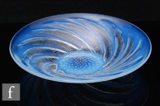 Rene Lalique - Poissons No 1 - An opalescent glass dish circa 1931, relief moulded with spiralling