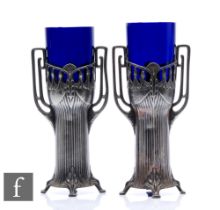 WMF - A pair of early 20th Century vases, circa 1905, the round funnel blue bowls to decorative
