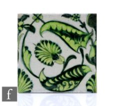 William De Morgan - Sands End Pottery - A 6 inch plastic clay tile decorated in the Persian taste