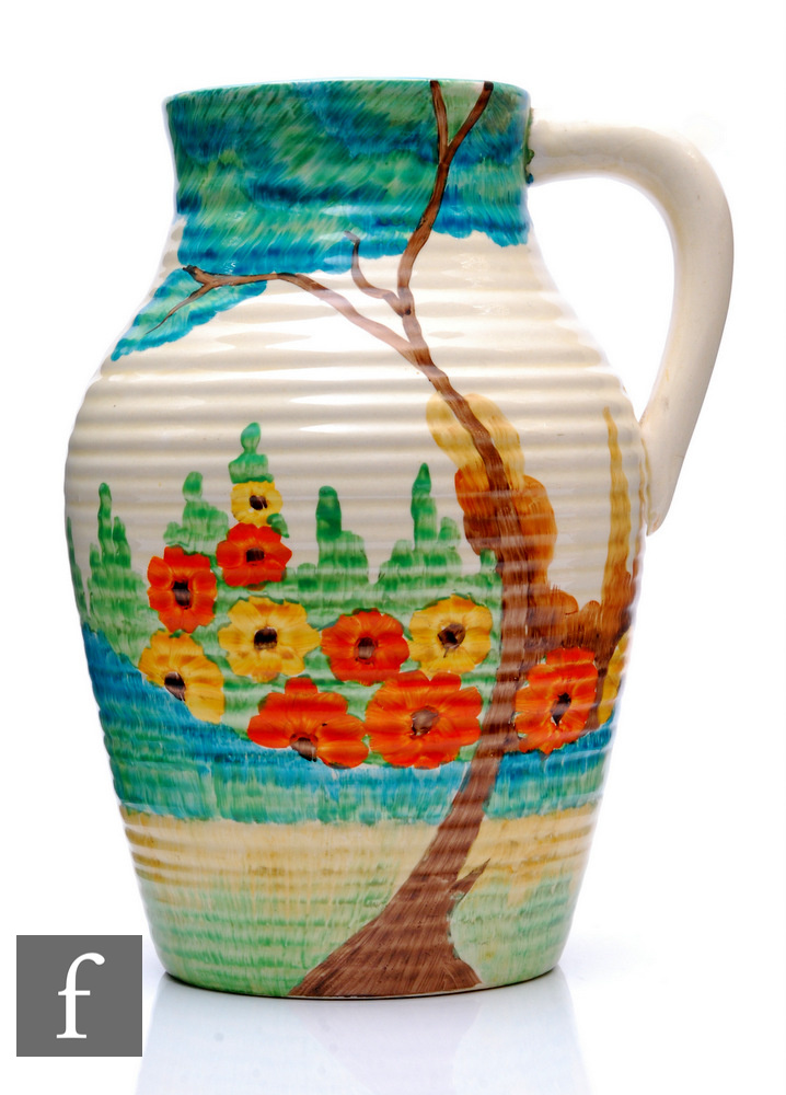 Clarice Cliff - Sandon - A single handled Lotus jug circa 1933, hand painted with a stylised tree