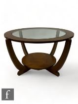 Victor Wilkins - G-Plan - A mid Century 'Astro' coffee table, the glass top raised on four curved