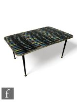 Jacqueline Groag - A mid Century 'Triangles' warite laminate table, raised on black and gilt splayed