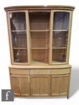 Nathan Furniture - A contemporary teak sideboard display case, the curved cabinet with cupboard