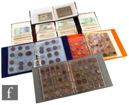 Banknotes - Three small flip albums to include notes from Germany, the Middle East, Jordan and